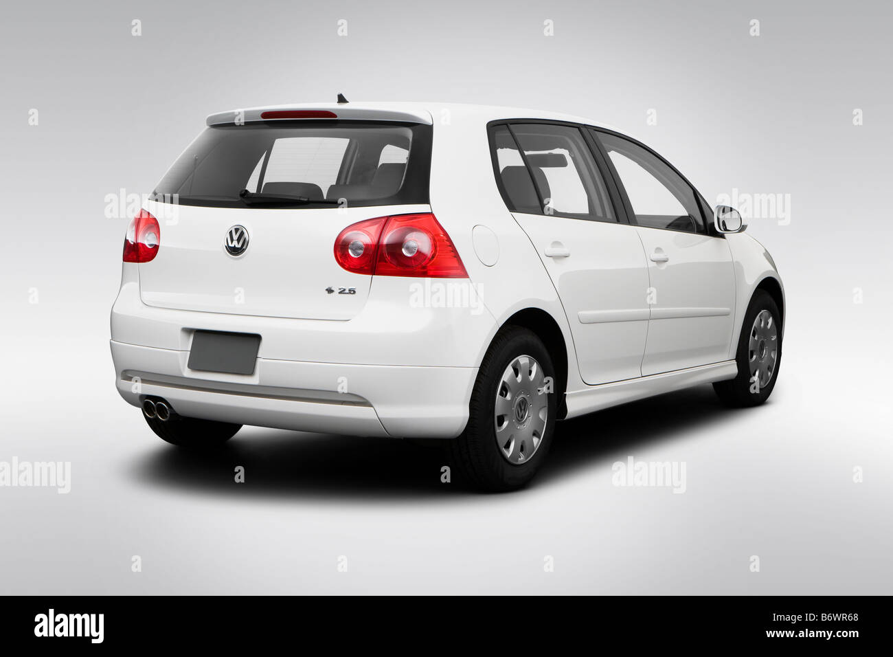 2009 Volkswagen Rabbit S in White - Rear angle view Stock Photo - Alamy