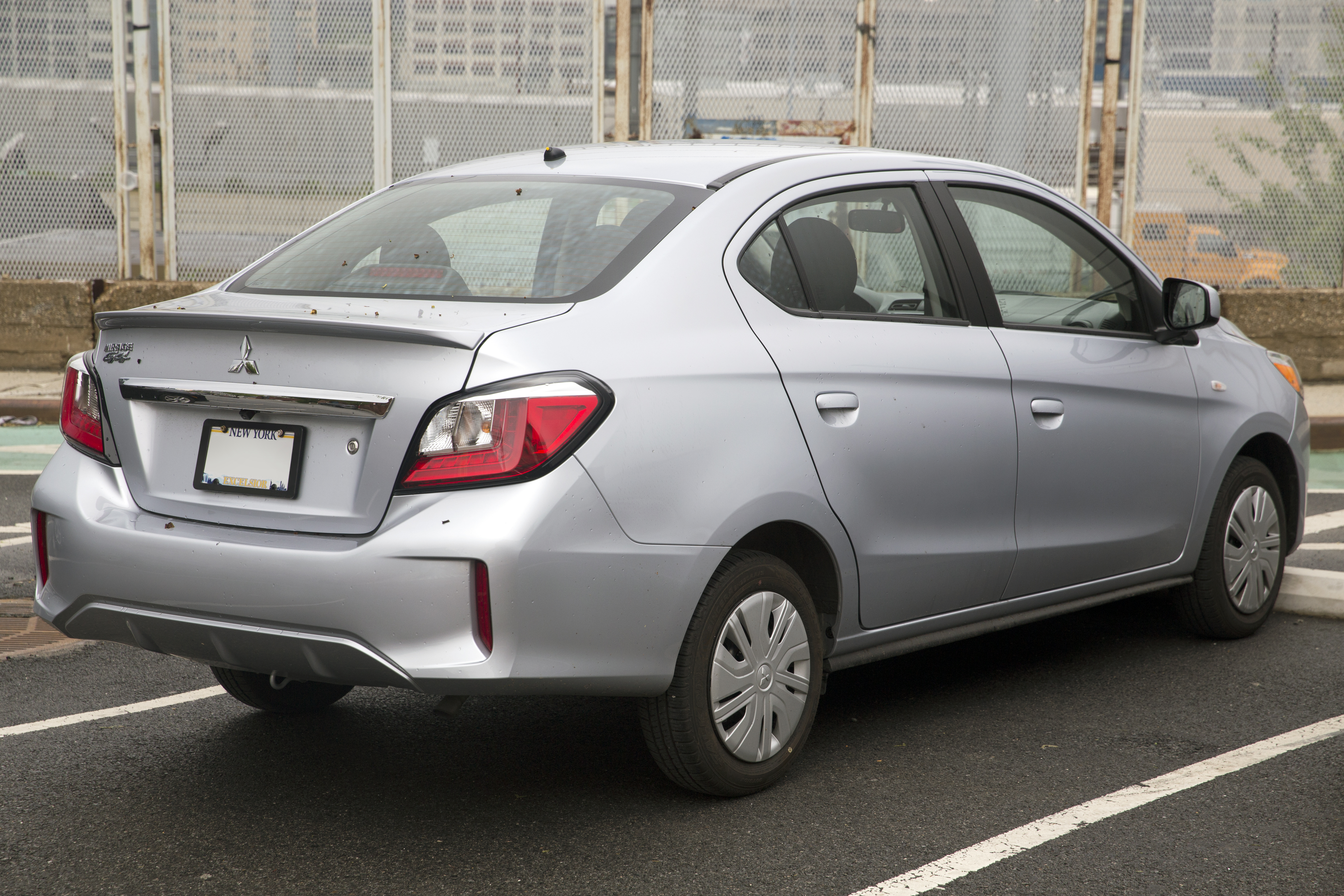 File:2021 Mitsubishi Mirage G4 ES in Starlight Silver Metallic, rear  right.jpg - Wikimedia Commons