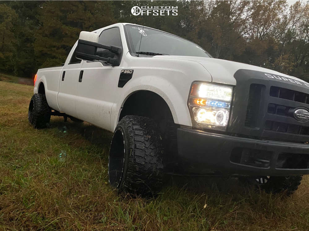 2009 Ford F-350 Super Duty with 22x14 -76 TIS 544BM and 35/12.5R22 Fury  Offroad Country Hunter MTII and Leveling Kit | Custom Offsets