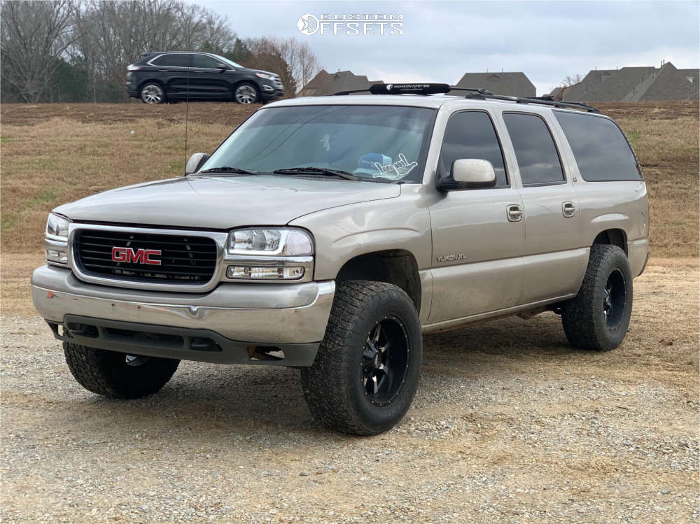 2002 GMC Yukon XL 1500 with 18x10 -24 Moto Metal Mo970 and 305/65R18 Nitto  Terra Grappler G2 and Suspension Lift 3.5" | Custom Offsets