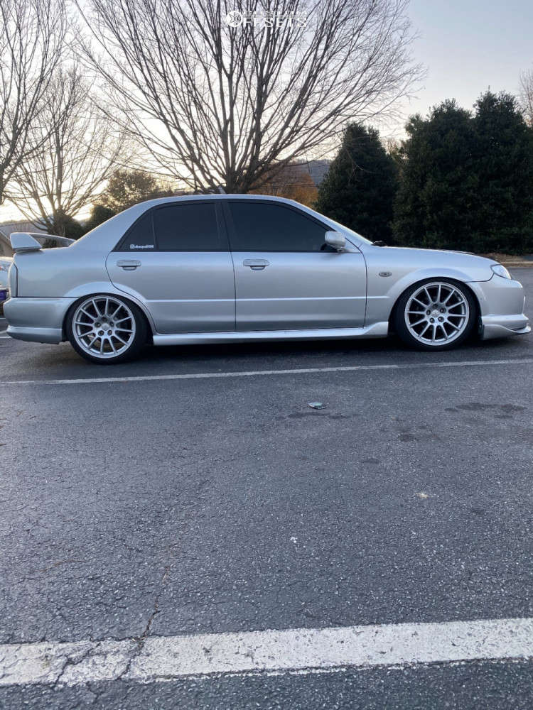 2003 Mazda Protege with 18x8.5 38 Enkei Ts10 and 215/40R18 Pantera ADVAN  Sport AS Plus and Coilovers | Custom Offsets