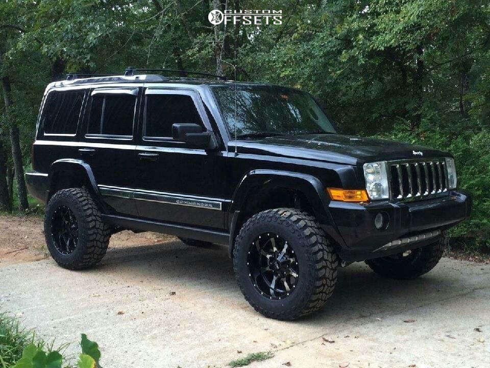 2007 Jeep Commander with 18x10 -23.876 Moto Metal Mo970 and 285/65R18  Cooper Discoverer Stt Pro and Suspension Lift 4" | Custom Offsets