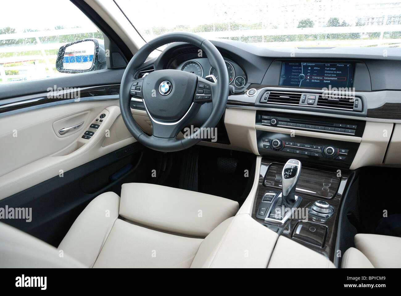 BMW 535i - MY 2010 - grey metallic - German premium higher class sedan,  segment E (executive) - interior, driver's place, cabin Stock Photo - Alamy
