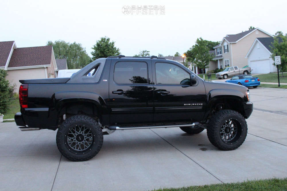 2012 Chevrolet Avalanche with 22x12 -51 Vision Rocker and 37/13.5R22 Nitto  Trail Grappler and Suspension Lift 9" | Custom Offsets
