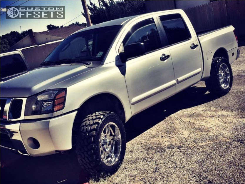 2007 Nissan Titan with 20x9 -12 XD Xd797 and 33/12.5R20 Suretrac Wide  Climber M/t and Suspension Lift 6" | Custom Offsets
