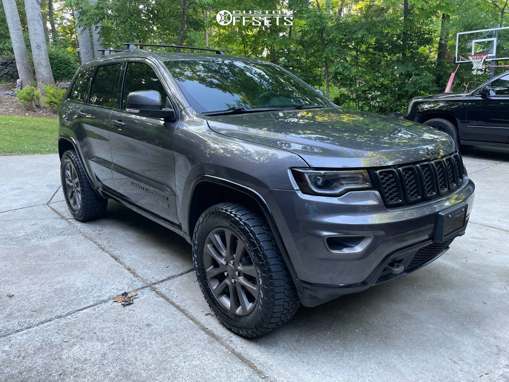 2016 Jeep Grand Cherokee with 20x8 Factory Reproductions Fr10 and  33/12.5R20 Falken Wildpeak At3w and Suspension Lift 2.5" | Custom Offsets