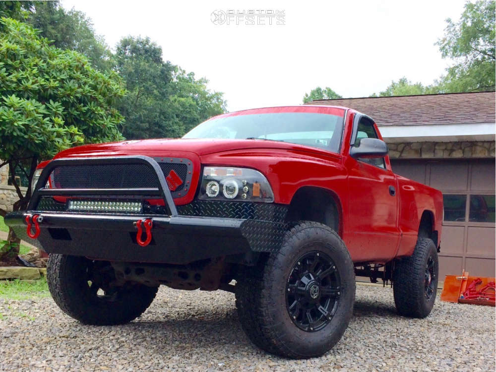 2001 Dodge Dakota with 17x9 -12 Anthem Off-Road Defender and 285/70R17  Nitto Terra Grappler G2 and Suspension Lift 3" | Custom Offsets