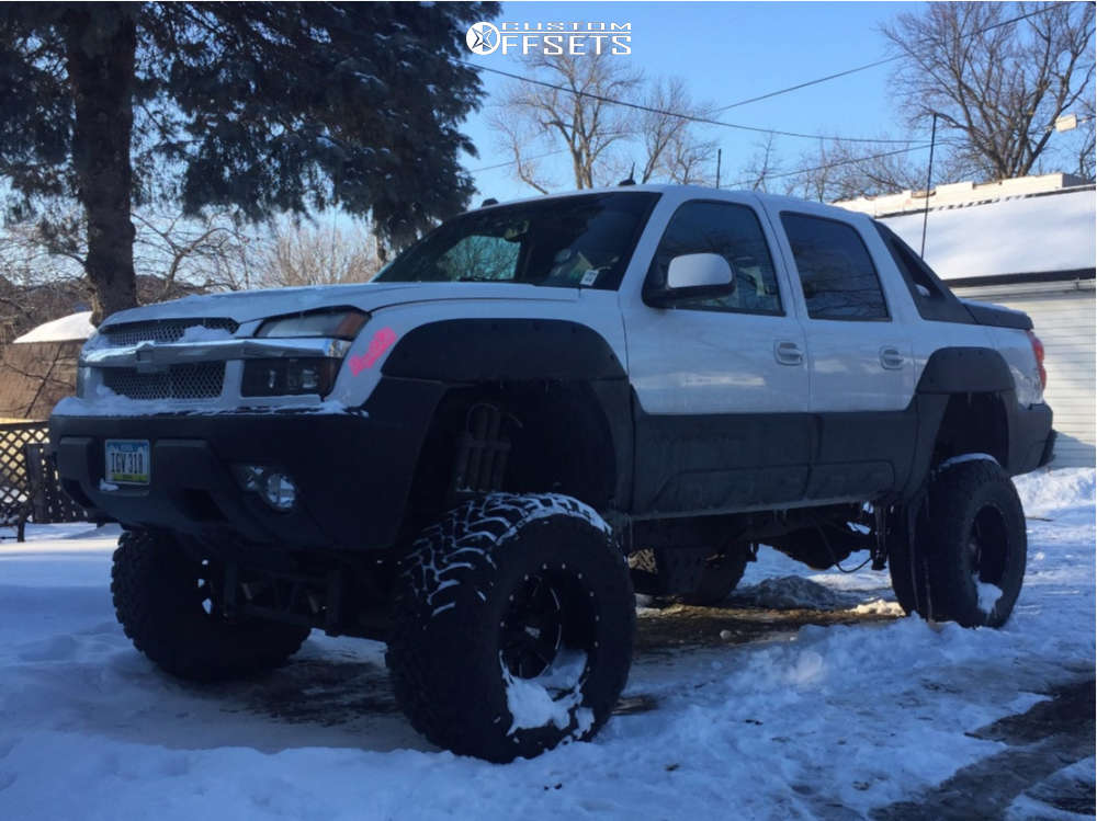 2005 Chevrolet Avalanche with 18x12 -44 Moto Metal Mo962 and 38/15.5R18  Toyo Tires Open Country M/T and Lifted >12" | Custom Offsets