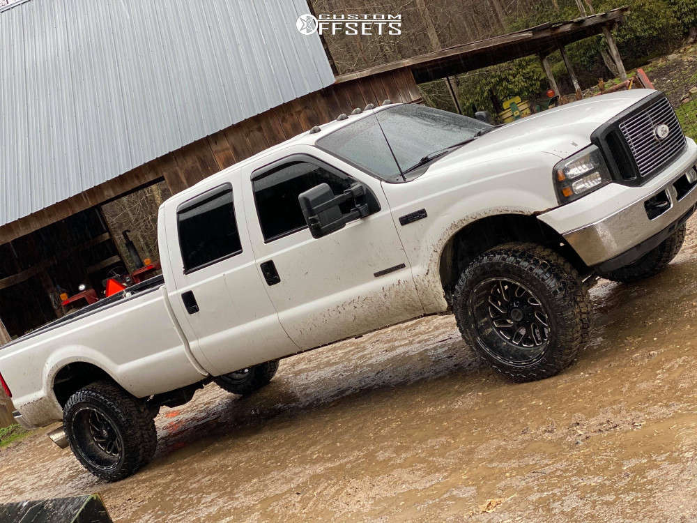 2001 Ford F-350 Super Duty with 22x12 -44 Fuel Triton and 35/12.5R22  Patriot Torque Mt and Leveling Kit | Custom Offsets