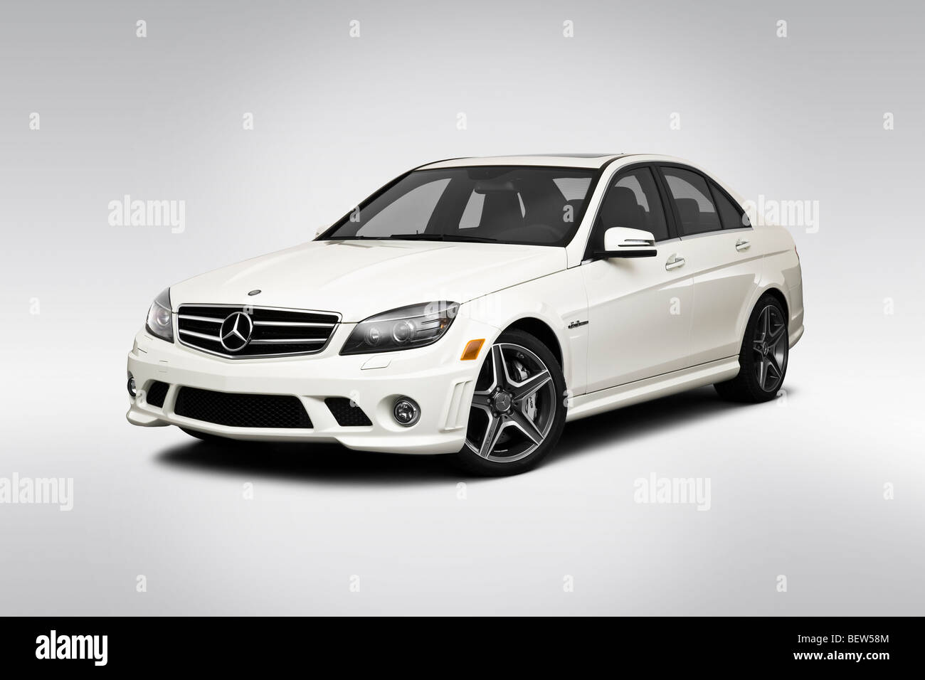 2010 Mercedes-Benz C-Class C63 AMG in White - Front angle view Stock Photo  - Alamy