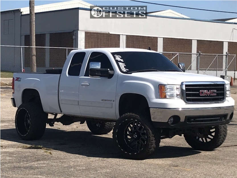 2007 GMC Sierra 1500 with 24x14 -76 TIS 544BM and 35/13.5R24 AMP Mud  Terrain Attack Mt A and Suspension Lift 9" | Custom Offsets
