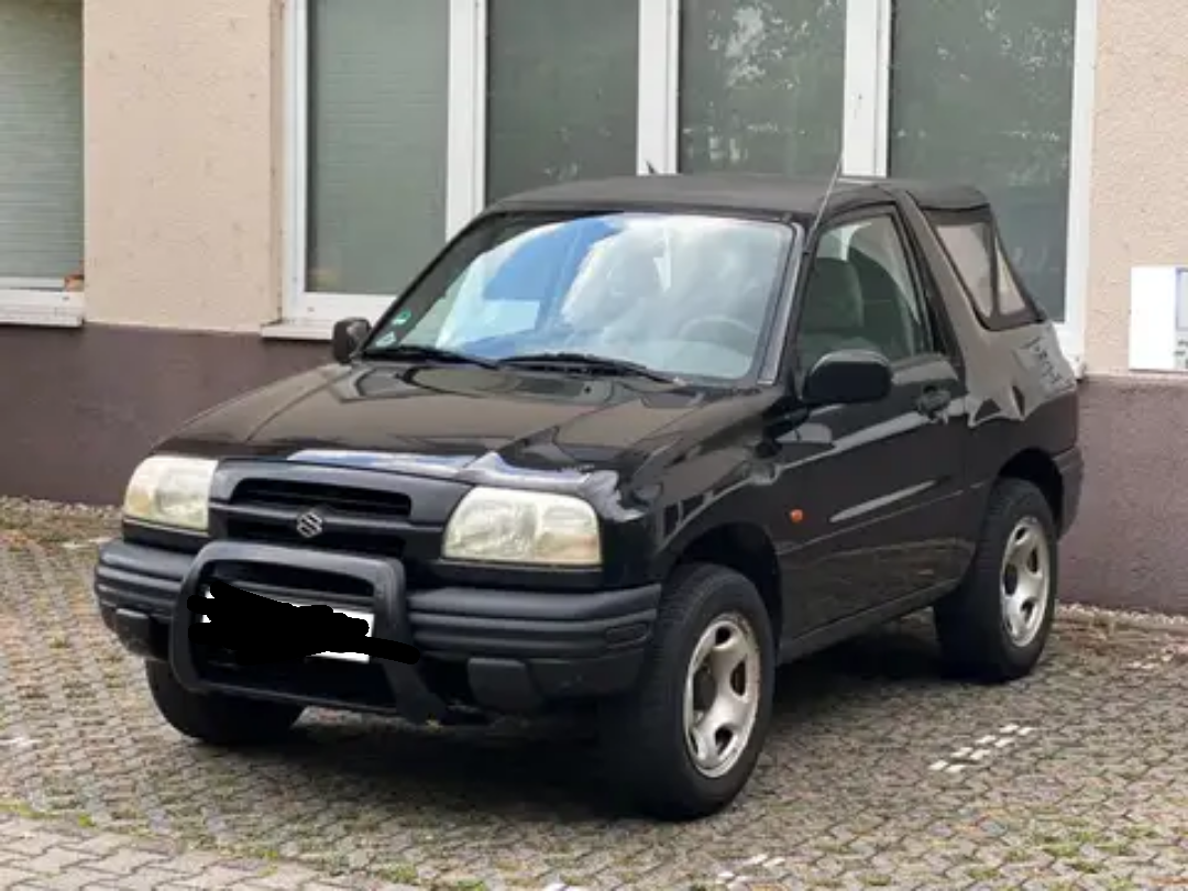 1999 Suzuki Grand Vitara 2.5 V6 manual...try roast my winter whore but even  with its 15 years old trash junkyard tires it can still go to places where  most of u fatasses