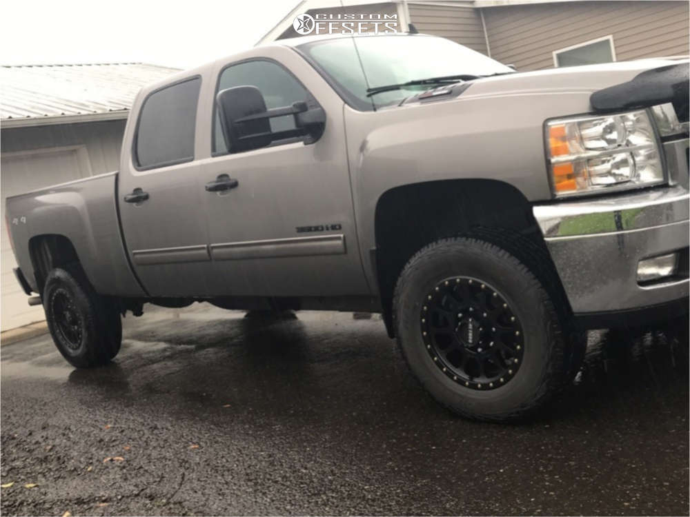 2013 Chevrolet Silverado 3500 HD with 18x9 18 Method Nv and 275/70R18  Cooper Discoverer At3 and Leveling Kit | Custom Offsets