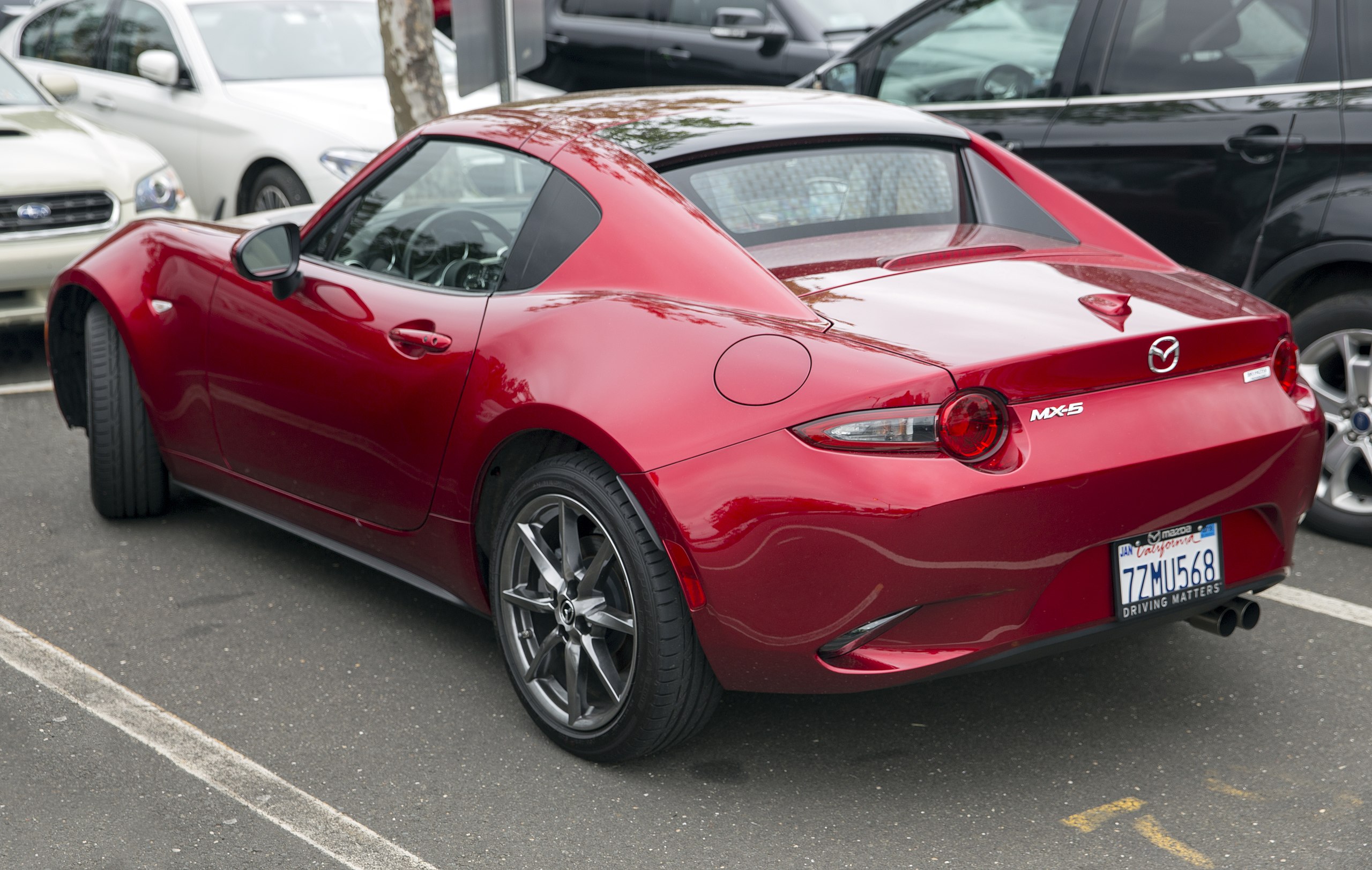 File:2018 Mazda MX-5 Miata RF Grand Touring Coupé in Soul Red Crystal, rear  left.jpg - Wikimedia Commons