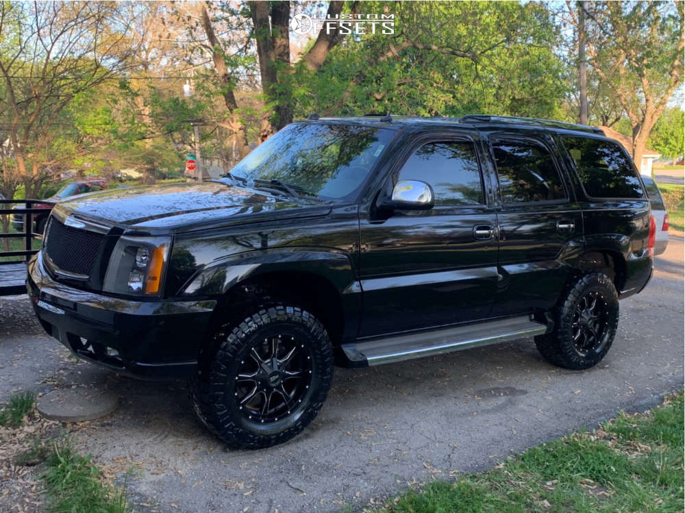 2005 Cadillac Escalade with 18x9 Moto Metal Other and 33/12.5R18 Nitto  Ridge Grappler and Suspension Lift 3" | Custom Offsets