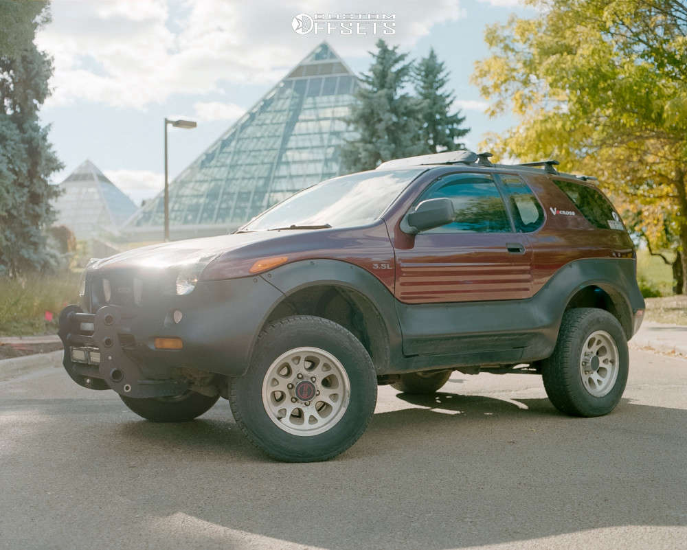 2000 Isuzu VehiCROSS with 16x7.5 38 OEM Wheels Snowflake and 29/9.5R16  Cooper Discoverer MS and Leveling Kit | Custom Offsets