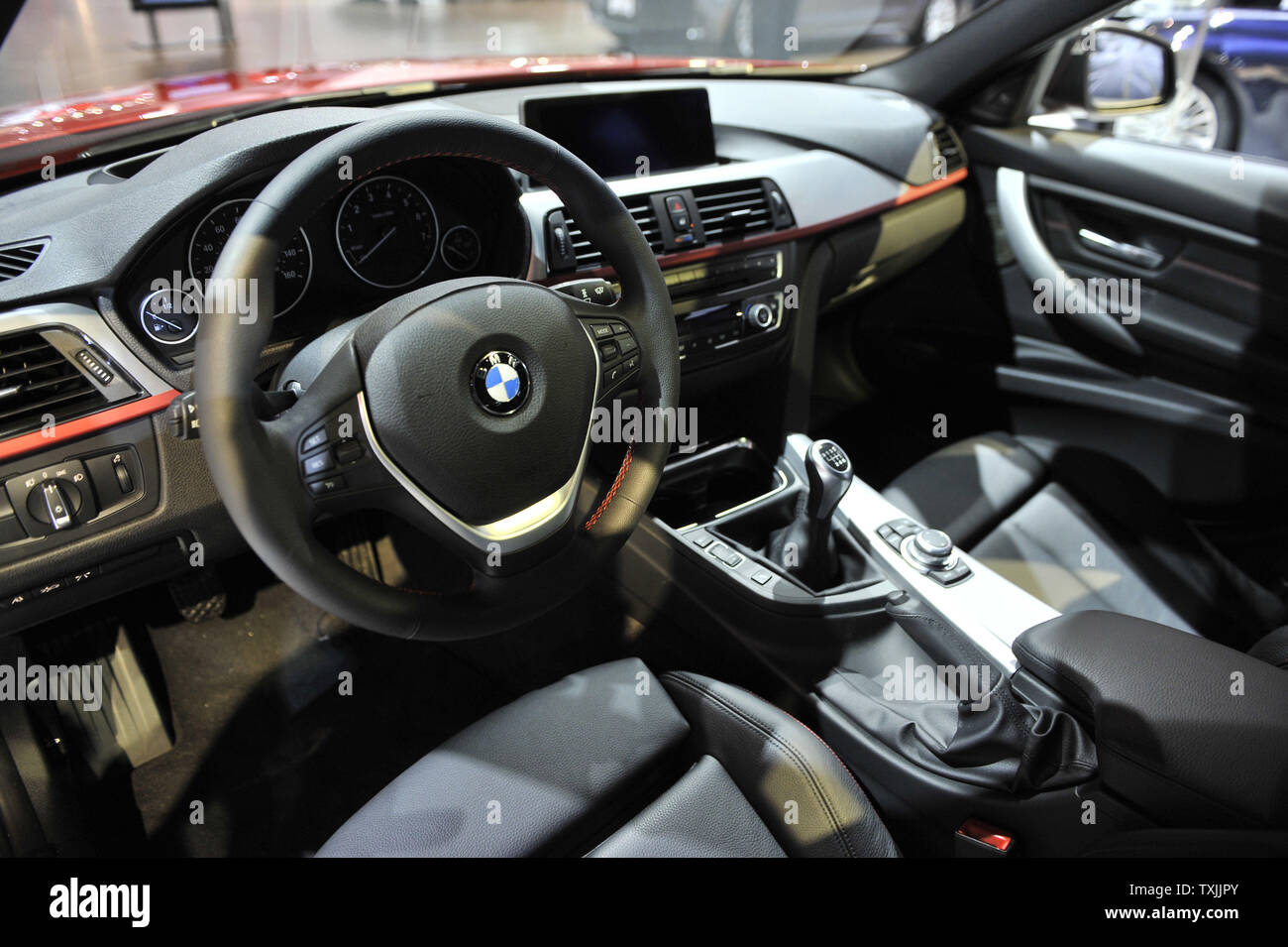 The interior of a 2013 BMW 328i is seen during the Chicago Auto Show at  McCormick Place on February 9, 2012 in Chicago. UPI/Brian Kersey Stock  Photo - Alamy