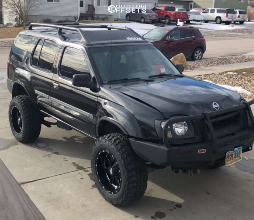 2002 Nissan Xterra with 18x10 -24 Moto Metal Mo962 and 275/65R18 Federal  Couragia Mt and Suspension Lift 2.5" | Custom Offsets