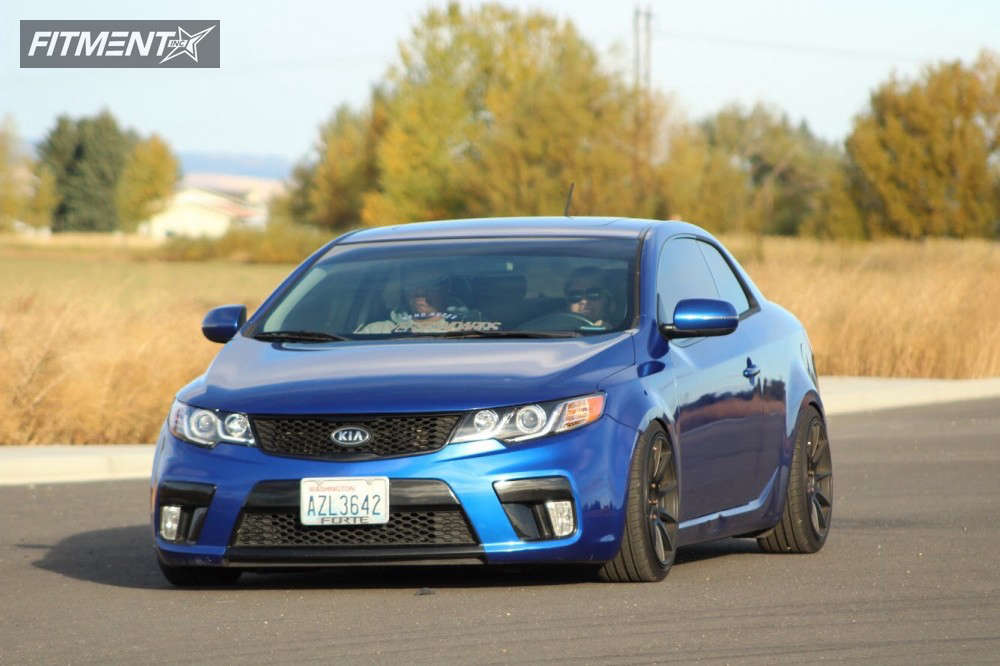 2011 Kia Forte Koup SX with 17x8.25 XXR 527 and Lexani 205x40 on Coilovers  | 291206 | Fitment Industries