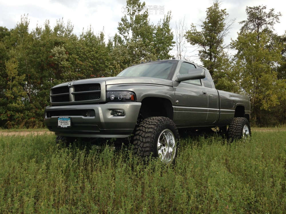 1998 Dodge Ram 3500 with 20x12 -44.45 Fuel Triton D609 and 37/13.5R20  Cooper Discoverer Stt Pro and Suspension Lift 7" | Custom Offsets