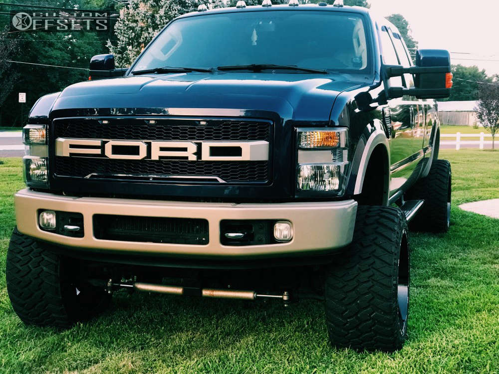 2009 Ford F-350 Super Duty with 22x14 -76 TIS 544BM and 375/45R22 Nitto  Trail Grappler and Suspension Lift 6" | Custom Offsets