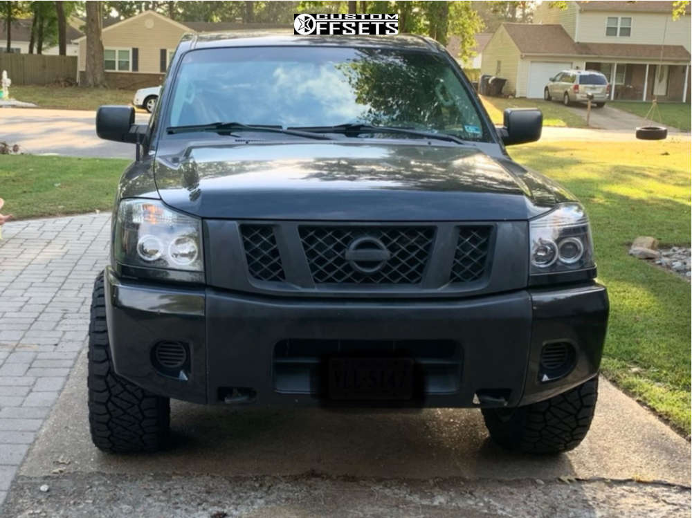 2012 Nissan Titan with 20x10 -25 Ultra Menace and 33/12.5R20 Nitto Ridge  Grappler and Leveling Kit | Custom Offsets