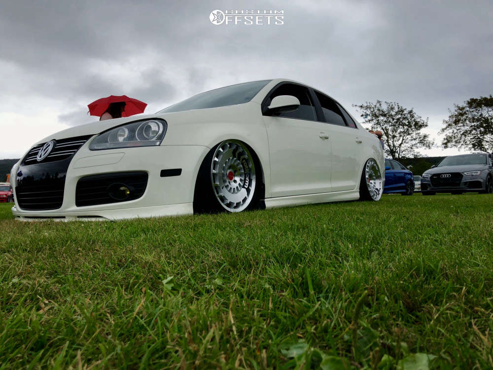 2008 Volkswagen Jetta with 18x8.5 45 Rotiform Ccv and 215/40R18 Yokohama S  Drive and Air Suspension | Custom Offsets
