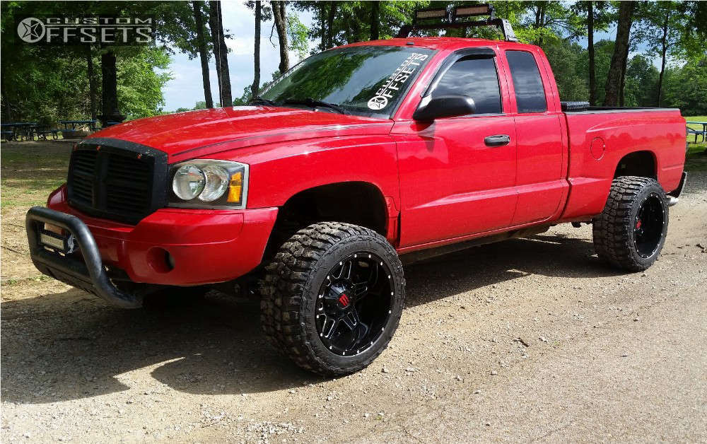 2006 Dodge Dakota with 20x12 -44 Monster Energy 538bm and 33/12.5R20  Federal Couragia Mt and Leveling Kit & Body Lift | Custom Offsets