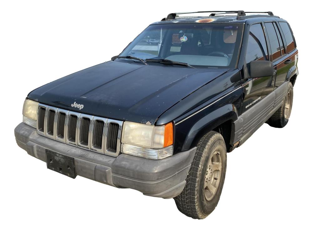 Lot - 1997 Jeep Grand Cherokee (Salvage Title) 139,677 Actual Miles Vin  #1J4GZ58S7VC633392