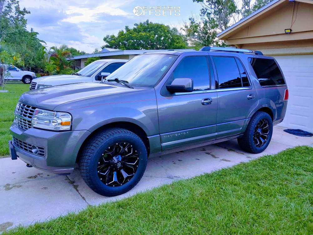 2014 Lincoln Navigator with 20x9 18 Fuel Assault and 33/12.5R20 Milestar  Patagonia At R and Stock | Custom Offsets