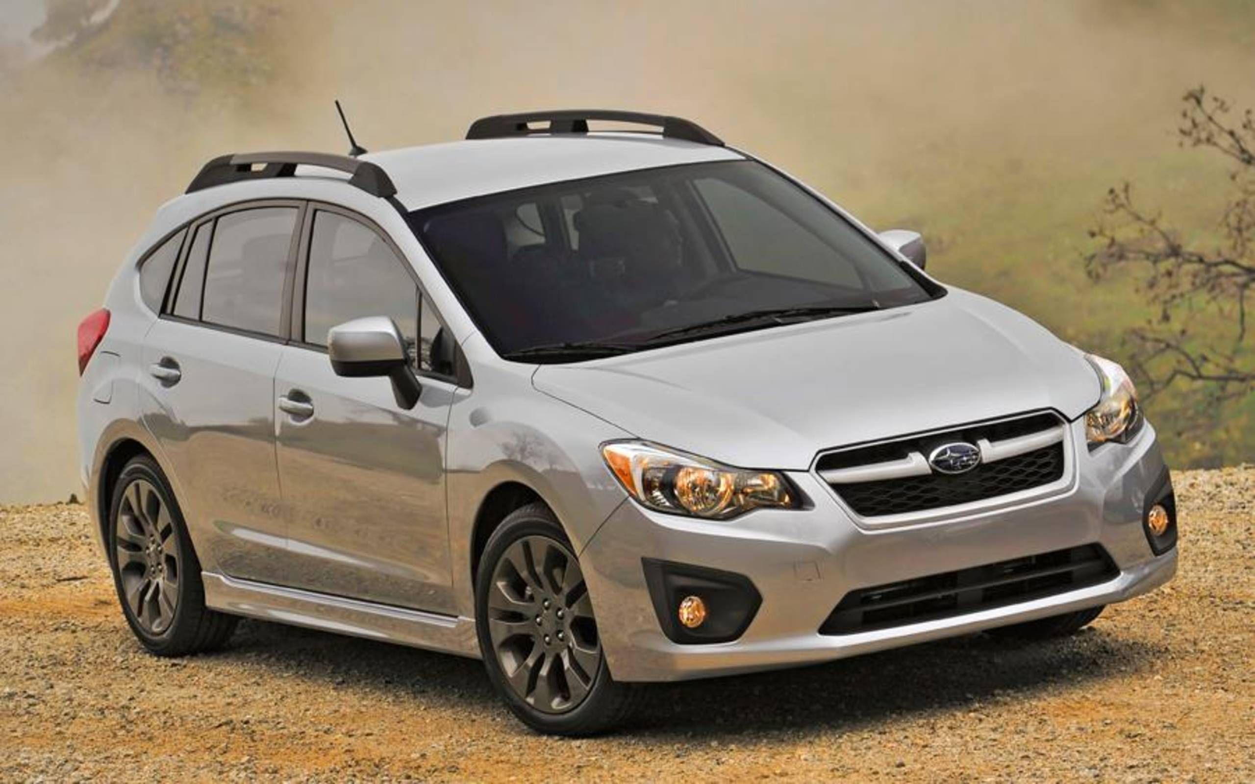 2012 Subaru Impreza 2.0i Sport Limited: Review notes: We like the AWD but  dread the CVT