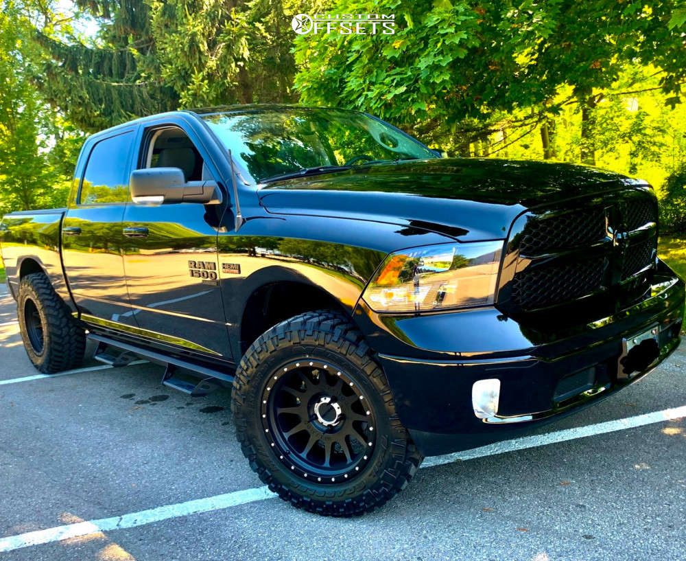 2020 Ram 1500 Classic with 20x10 -24 Method Mr605 and 35/12.5R20 Nitto  Trail Grappler and Leveling Kit | Custom Offsets