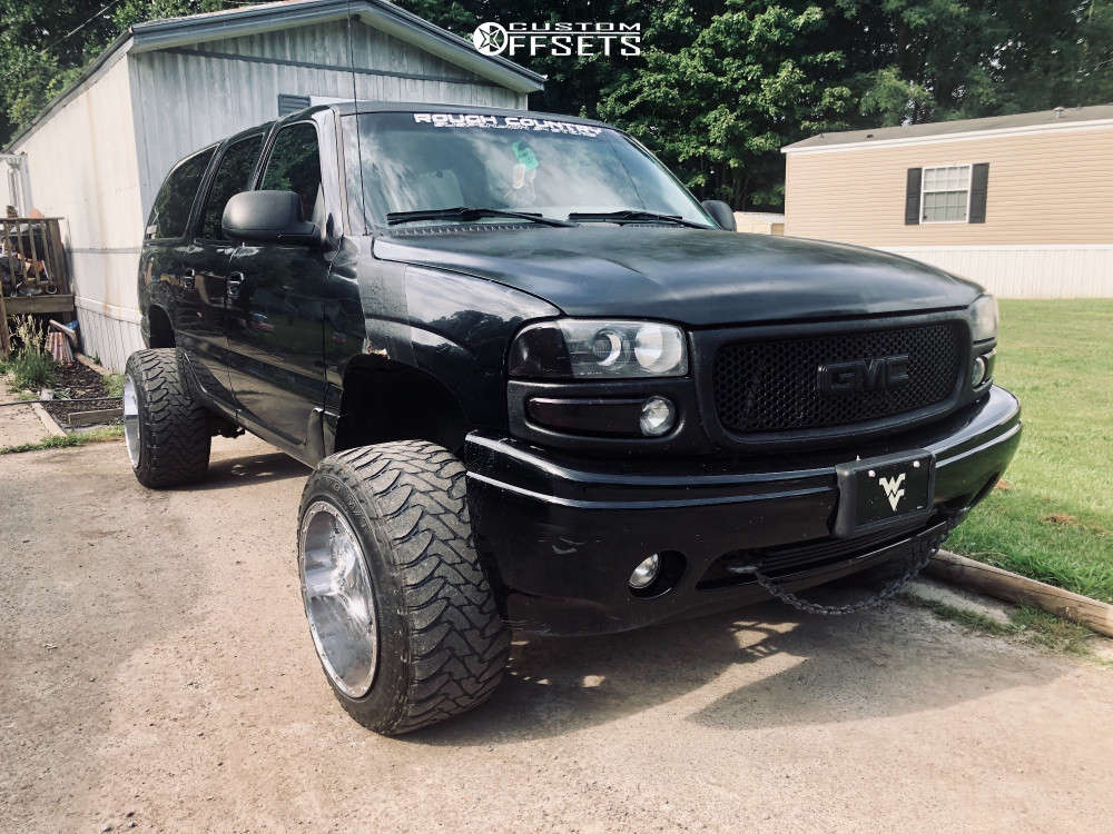 2001 GMC Yukon XL 1500 with 20x14 -76 Fuel Hostage and 33/12.5R20 Toyo  Tires Open Country M/T and Suspension Lift 6" | Custom Offsets