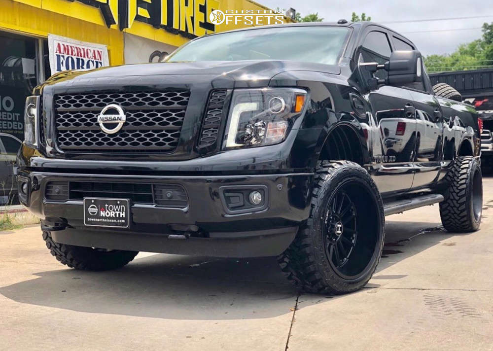 2018 Nissan Titan XD with 22x12 -44 Hostile Predator and 33/12.5R22 Toyo  Tires Open Country M/T and Leveling Kit | Custom Offsets