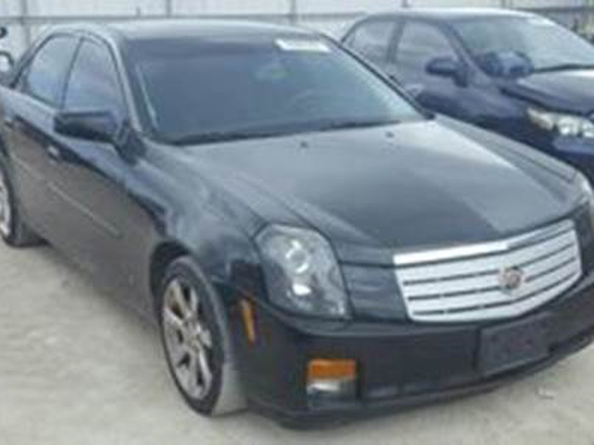 Illinois State Police look for 2007 black Cadillac CTS involved in  hit-and-run