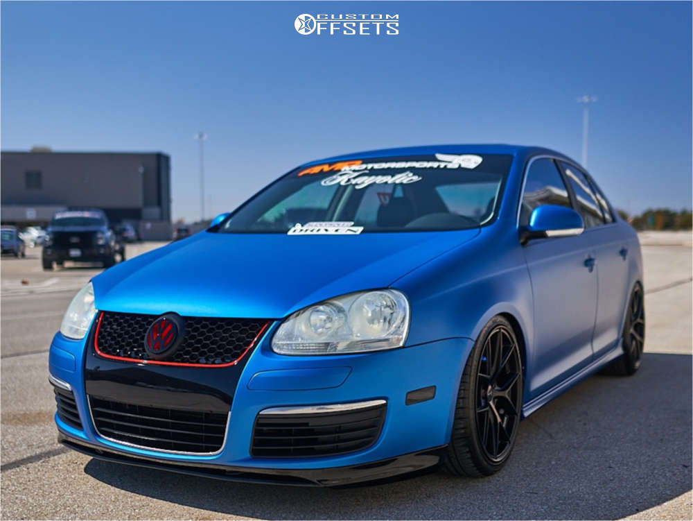 2009 Volkswagen Jetta with 18x8 36 Superspeed RFF05 and 215/40R18 Duraturn  Mozzo and Air Suspension | Custom Offsets