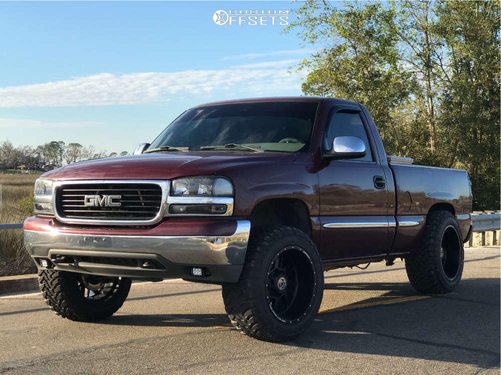 2002 GMC Sierra 1500 with 20x12 -44 Anthem Off-Road Gunner and 33/12.5R20  Toyo Tires Open Country M/T and Suspension Lift 4" | Custom Offsets