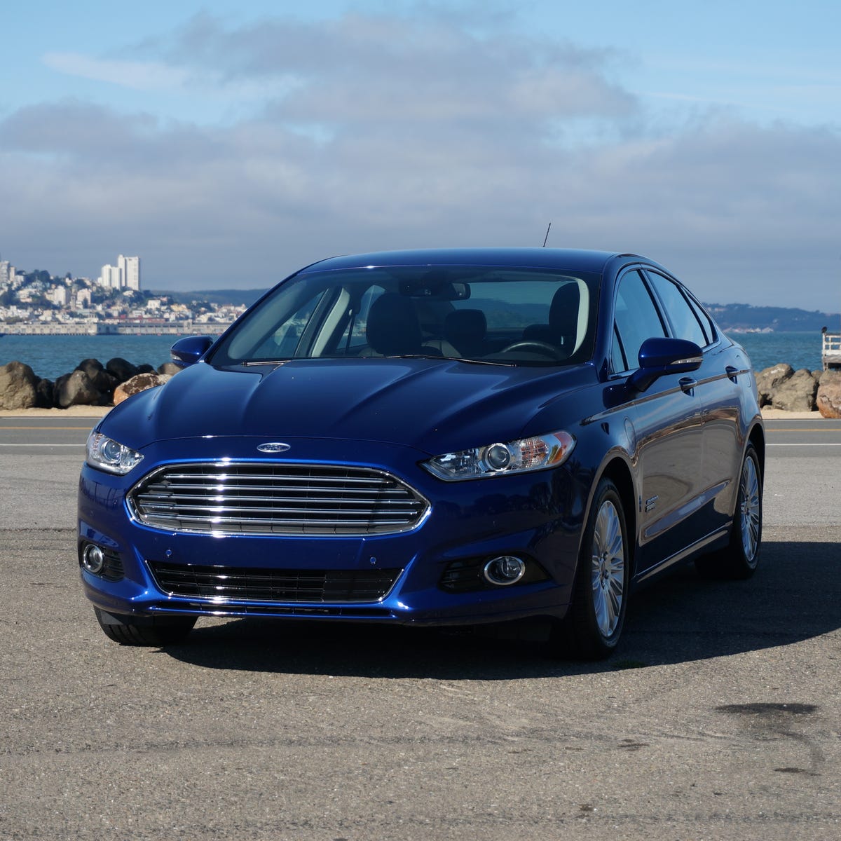 2015 Ford Fusion Titanium Energi review: Ford plug-in hybrid fuses EV  efficiency with hybrid range - CNET