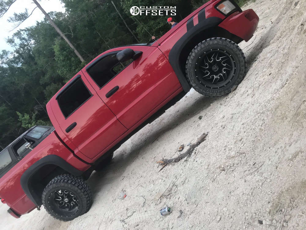 2008 Dodge Dakota with 20x12 -44 Hardcore Offroad Hc05 and 33/12.5R20 Fury  Offroad Country Hunter MTII and Suspension Lift 3" | Custom Offsets