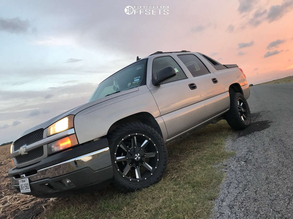 2006 Chevrolet Avalanche 1500 with 20x10 -25 Cali Offroad Busted and  285/65R20 AMP Terrain Attack At A and Stock | Custom Offsets