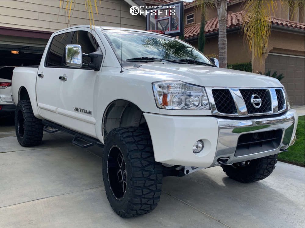 2005 Nissan Titan with 20x10 -24 Moto Metal Mo981 and 35/12.5R20 Nitto Mud  Grappler and Suspension Lift 6" | Custom Offsets