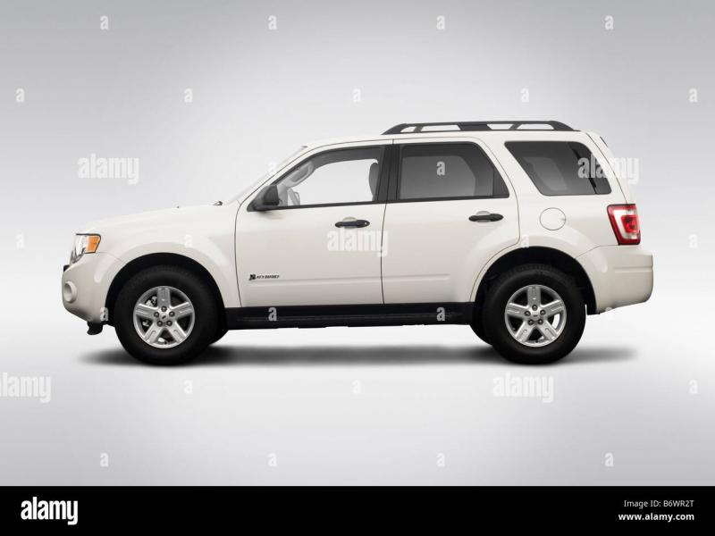2009 Ford Escape Hybrid in White - Drivers Side Profile Stock Photo - Alamy