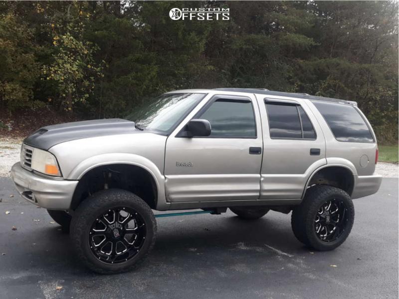 2000 Oldsmobile Bravada with 20x10 -24 XD Buck and 305/55R20 Toyo Tires  Open Country A/T III and Suspension Lift 6" | Custom Offsets